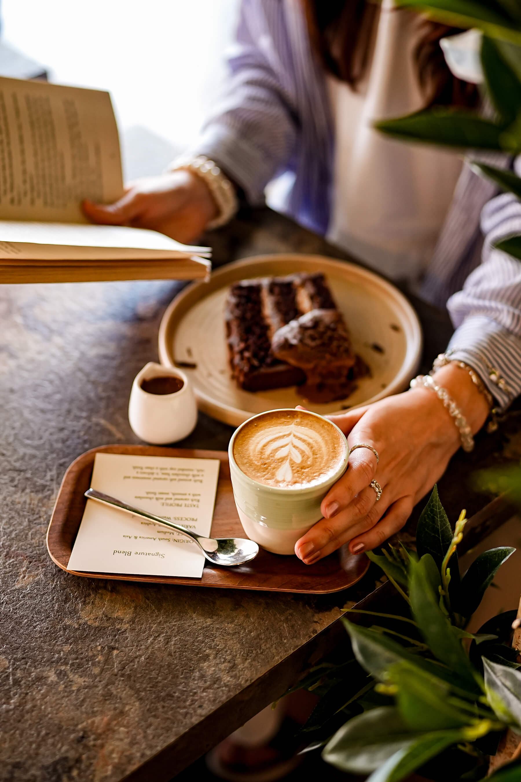 TOVE mindful coffee ritual with flat white and book
